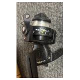 Six Fishing Poles with Two Red Wolf Reels