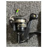 Six Fishing Poles with Two Red Wolf Reels