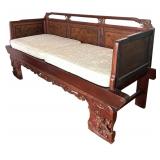 Vintage Opium Bed with Intricate Carvings and Cushions