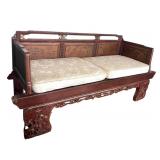Vintage Opium Bed with Intricate Carvings and Cushions