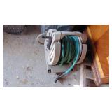 Hose Reel, Trash Can with Pole Saw and Misc Garden Tools