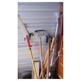 Hose Reel, Trash Can with Pole Saw and Misc Garden Tools