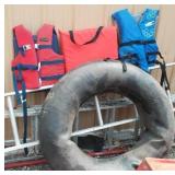 Lake Tube, life Jackets (2) and flotation Cushion.