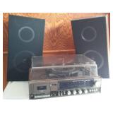 Channel Master AM/FM Stereo Cassette recorder with speakers.