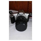 Minolta (2) and Cannon Camera, Tripod, lenses and more.