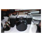 Minolta (2) and Cannon Camera, Tripod, lenses and more.