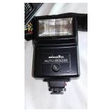 Minolta (2) and Cannon Camera, Tripod, lenses and more.