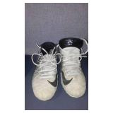 Wilson Baseball Helmets (2) and shoes.