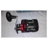 Berkly and Zebco Reels (5), Nets (2) and Rubbermaid Pro Series Tackle Box.