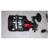 Berkly and Zebco Reels (5), Nets (2) and Rubbermaid Pro Series Tackle Box.