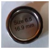 Silver Colored Ring Band with Wave Design.