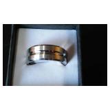 Silver Colored Ring Band with Wave Design.