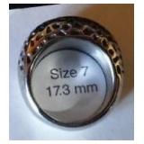 Silver Colored Ring Band with Wave Design.