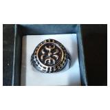 Silver Colored Ring Band with Wave Design.