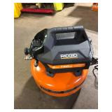 RIDGID 6 Gal. 150 PSI Portable Electric Oil-Free Jobsite Pancake Air Compressor with Dual Pressure Gauges and 2-Quick Couplers Customer Returns See Pictures