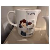 Collection of 4 Ceramic Pitchers and Teapots Featuring Vintage Designs