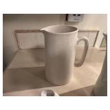 Collection of 4 Ceramic Pitchers and Teapots Featuring Vintage Designs