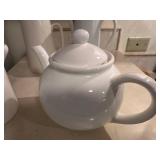 Collection of 4 Ceramic Pitchers and Teapots Featuring Vintage Designs