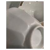 Set of 11 Scalloped White Porcelain Bowls