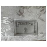 Collection of Vintage Table Linens with Embroidery and Damask Patterns