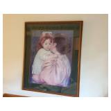 Framed Artwork of Mother Holding Child