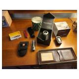 Assortment of Watches, Blood Oximeter, Pocket Knives, and Wallet