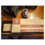 Assortment of Watches, Blood Oximeter, Pocket Knives, and Wallet