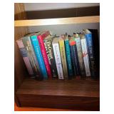 Wooden Bookshelf with Assorted Books Collection
