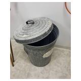 Set of Household Brooms, Extension Cords, and Metal Trash Can