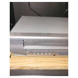 Cabinet with LG Blu-ray Player and Sylvania DVD Player with Remote Controls