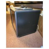 Cabinet with LG Blu-ray Player and Sylvania DVD Player with Remote Controls