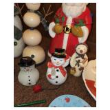 Assorted Christmas Decor Collection Including Santa Statues and Snowmen