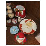 Assorted Christmas Decor Collection Including Santa Statues and Snowmen