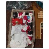 Holiday Decor Collection Featuring Santa Figurines and Accessories
