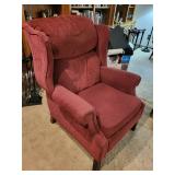 Used Red Wingback Armchair with Minor Wear