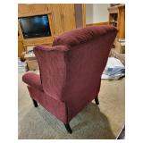 Used Red Wingback Armchair with Minor Wear