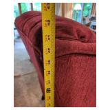 Used Red Wingback Armchair with Minor Wear