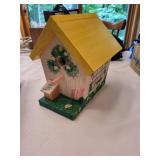 Collection of Decorative Items Including Birdhouse and Ornaments