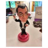 Collection of Decorative Items Including Birdhouse and Ornaments