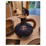 Assorted Decorative and Collectible Items Including Books and Plate