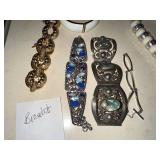 Collection of Vintage Jewelry Including Necklaces, Bracelets, and Pins