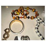 Collection of Vintage Jewelry Including Necklaces, Bracelets, and Pins