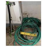 Collection of Garden Hoses with Adjustable Nozzle Sprayer and Sprinkler Stands