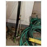 Collection of Garden Hoses with Adjustable Nozzle Sprayer and Sprinkler Stands