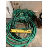 Collection of Garden Hoses with Adjustable Nozzle Sprayer and Sprinkler Stands
