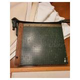 Collection of Wall Decor, Paper Cutter, and Corkboard