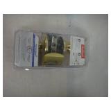 Kwikset Tylo Polished Brass Bed/Bath Door Knob Featuring Microban Antimicrobial Technology with Lock