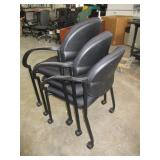 UPHOLSTERED STACKING CHAIRS WITH ARMS AND WHEELS