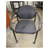 UPHOLSTERED STACKING CHAIRS WITH ARMS AND WHEELS