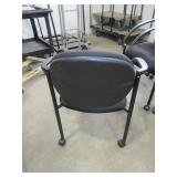 UPHOLSTERED STACKING CHAIRS WITH ARMS AND WHEELS